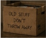 A worn banker box labeled old stuff, don't throw away.