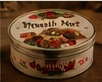 A decorative Brazil nut fruitcake tin.