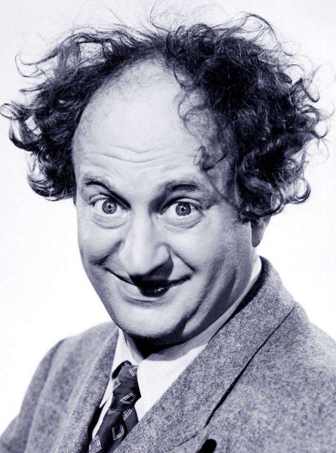 A black-and-white portrait of Larry.