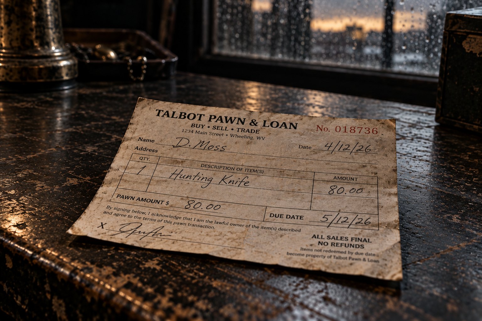A worn Talbot Pawn & Loan ticket for an eighty-dollar loan on a hunting knife.